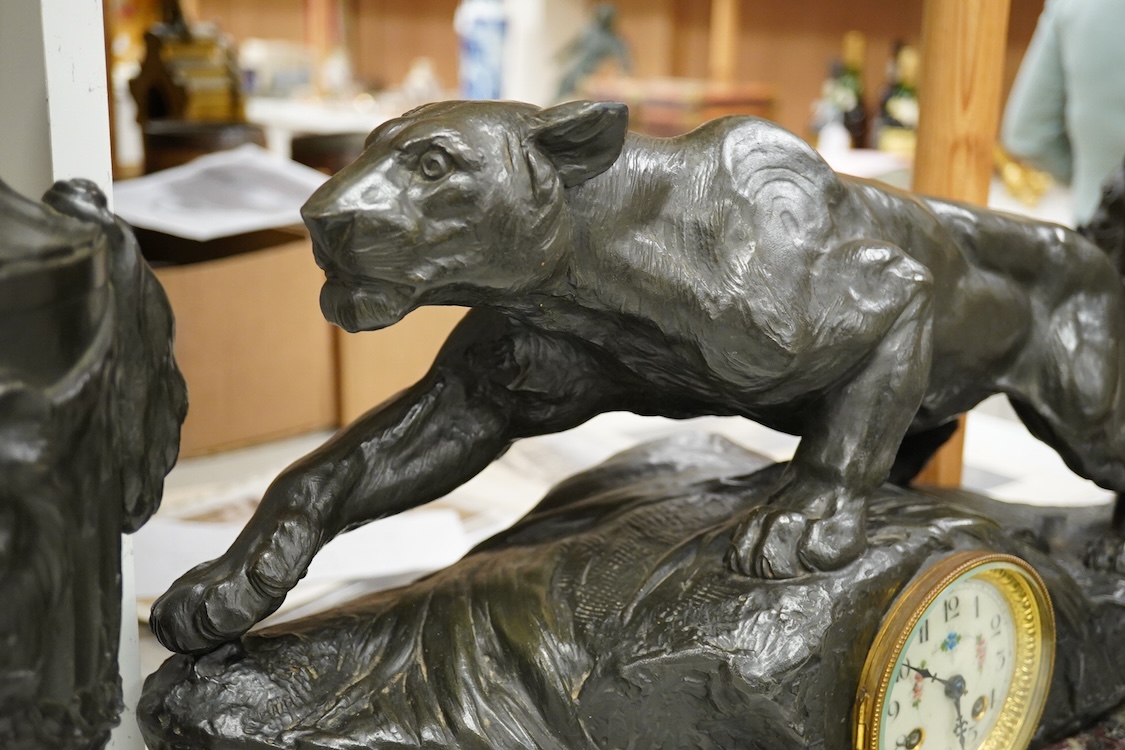 A clock garniture signed Boffil, ‘Lionne aux Agnets’